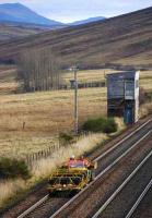 A pair of 6 seater trolleys and tractor unit passing the former Dalnacardoch box on 15 November. <br><br>[Bill Roberton 15/11/2007]