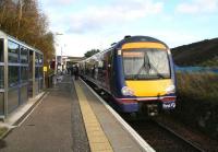 Widening work on the Bathgate branch has almost reached Livingston North station, where a Bathgate - Edinburgh service is seen boarding on 15 November. <br><br>[John Furnevel 15/11/2007]