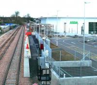 A view east from the starting signal, along the new platform at Alloa on 11 November. The scaffolding surrounds a framework which will eventually become the station building.<br><br>[Brian Forbes 11/11/2007]