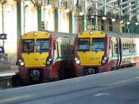 334004 and 334029 at Platform 12 & 13 of Glasgow Central on 27th September <br><br>[Graham Morgan 27/09/2007]