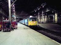 Preston station at 11pm, as a class 85 pulls up at the platform with a southbound train on 27 April 1990. <br><br>[John McIntyre 27/04/1990]