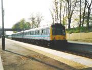117 308 arrives at Dalgety Bay with an Inner Circle train in May 1999.<br><br>[David Panton /05/1999]