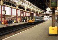 A Regional Railways class 142 stands at platform 2 at Preston station in 1990.<br><br>[John McIntyre //1990]