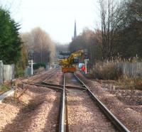 View towards Alloa from Cambus level crossing on 29 November 2007 showing Alloa West loop with work in progress on one of the signals. In the background stands the imposing spire of the church of St Mungo (1819) in Bedford Place.<br><br>[John Furnevel 29/11/2007]