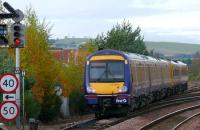 A 158/170 five car DMU leaves the main line at Ladybank and heads northwest to Collessie and Perth.<br><br>[Brian Forbes /11/2007]