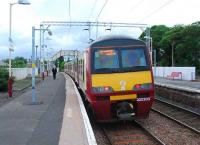 A westbound service pauses at Cardross on 13 June.<br><br>[Ewan Crawford 13/06/2007]