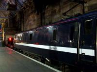 91101 at Glasgow Central on 8 December showing the National Express East Coast branding being applied to the GNER fleet in advance of the change of franchise.<br><br>[Graham Morgan /12/2007]