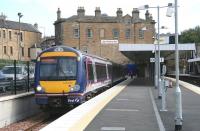 A Fife service standing in the new platform 0 bay at Haymarket on 6 September 2007 with the original 1842 E&G building as a backdrop and the rear of the 1862 Caledonian Alehouse (formerly the Haymarket Station Bar) to the left... though not for much longer... [see image 20669]<br><br>[John Furnevel 06/09/2007]