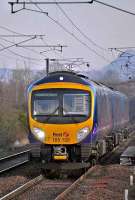 The 11.52 FTPE 185 service to Manchester Airport passes through Kingsknowe on 14 December.<br><br>[Bill Roberton 14/12/2007]