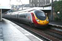 The 1010 Edinburgh - London Euston pulls into platform 4 at Haymarket on 20 December. The Pendolino works into Waverley each morning as the 0840 <I>local</I> from Carstairs (to which it runs <I>empty stock</I> from Glasgow Central) [See image 15040].<br><br>[John Furnevel 20/12/2007]