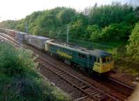 Freightliner-hauled container train passing Mossend East Junction in 2002.<br><br>[Ewan Crawford //2002]