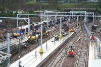 Electrification work underway on The Mound central tunnel and west end platforms on 28 December seen from Waverley Bridge. A Glasgow shuttle is arriving at platform 13, with platforms 14 - 17 cordoned off out of use. <br><br>[John Furnevel 28/12/2007]