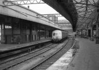 A class 101 DMU stands at platform 7 alongside Aberdeen Centre signal box on 26 May 1973.<br><br>[John McIntyre 26/05/1973]
