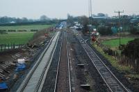 View looking east at Eastriggs. The newly laid eastbound track is to the left. Other than the crossover it is not connected to the rest of the network. MOD depot to right.<br><br>[Ewan Crawford 03/01/2008]