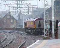 66234 passing through Paisley Gilmour Street in the rain heading for Longannet PS <br><br>[Graham Morgan 14/01/2008]
