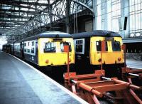 <I>The old order.</I> Glasgow Central - Ayr line DMUs stand at platforms 12 and 13 at Central station on 13 October 1986.<br><br>[David Panton 13/10/1986]