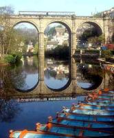 Knaresborough Viaduct in North Yorkshire, seen with a DMU crossing in 1979. The 1851 structure, with a total span of 338 feet, carries rail traffic 90 feet above the Nidd Gorge on the line between York and Leeds via Harrogate. <br><br>[Ian Dinmore //1979]