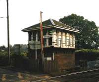 The old signal box standing at Greenfoot level crossing near Glenboig, photographed in September 1998. The box was demolished just over six months later.<br><br>[David Panton /09/1998]