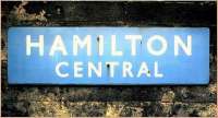 Enamel station nameboard at Hamilton Central - March 1985.<br><br>[David Panton /03/1985]