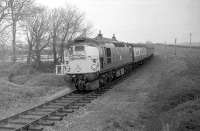 The GNSRA <I>Formartine & Buchan Railtour</I> to Peterhead and Fraserburgh, heading south at Brucklay station behind D5323 on 24 May 1969. [With thanks to John Williamson for additional information.] <br><br>[Robin Barbour collection (Courtesy Bruce McCartney) 24/05/1969]