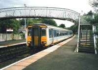 Glasgow Central - Edinburgh service at Hartwood in July 1998 formed by DMU 156 432. <br><br>[David Panton /07/1998]