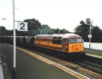 56018 passes through Inverkeithing station in July 1998 on its way back to Hunterston with coal empties.<br><br>[David Panton /07/1998]