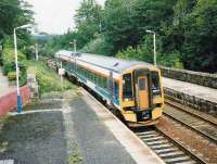 Aberdeen bound service formed by 158 701 at Huntly in June 1999.<br><br>[David Panton /06/1999]
