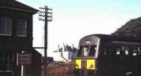 A DMU heading for St Andrews seems to be pondering the warning sign as it passes Guard Bridge in 1967. The station had closed two years earlier in September of 1965, while St Andrews itself survived until January 1969.<br><br>[Bruce McCartney /09/1967]