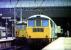 Class 86 and 87 locomotives stand ready to take WCML expresses north out of Euston in March 1976.<br><br>[John McIntyre 20/03/1976]