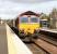 A return Georgemas Junction - Hartlepool freight consisting of empty pipe flats comes off the Perth line at Ladybank on 20 September 2007 and runs south through the station.<br><br>[John Furnevel 20/09/2007]