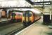 View south at Dumfries in July 1998 with 156 510 bound for Carlisle and 156 505 for Glasgow Central.<br><br>[David Panton /07/1998]