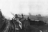 A B1 4-6-0 shunts vans at Rumbling Bridge on the last day of freight service. The vans contain potatoes for March (Cambs.)<br><br>[Garry Morton 19/4/1964]