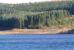 View near the site of Plashetts station on 8 November 2007, taken from the west side of Kielder Water, with the remains of the station and sidings now lying below the reservoir. The coal found in the hills above Plashetts was one of the key factors in the decision to build the Border Counties line. <I>Slaters Incline</I>, down which loaded coal wagons (latterly from Far Colliery) were lowered to the sidings alongside Plashetts station, came in from the right. This was part of the original Plashetts Colliery Wagonway. [See image 26241]<br><br>[John Furnevel 08/11/2007]