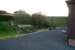 Platform scene at Woodburn on 7 November 2007. View is southwest towards Reedsmouth. The original roadbridge to the right, that carried the A68 over the trackbed, has now been turned into an embankment [with thanks to the lady of the house].<br><br>[John Furnevel 07/11/2007]