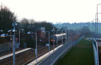 The road into the former goods shed where 60009 was once stored stands empty at Markinch in November 2007, as a late afternoon service for Edinburgh heads south.<br><br>[Brian Forbes 01/11/2007]