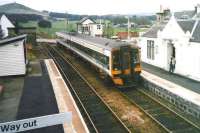 158 729 runs into Insch station over the level crossing in October 1998 with a service for Aberdeen.<br><br>[David Panton /10/1998]
