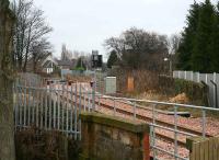 View east beyond the buffer stops at Alloa station on 14 February as the line crosses the bridge over the B9096 road and heads for Longannet. <br><br>[John Furnevel 14/02/2008]