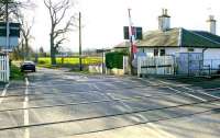 View south over Inchyra AHB level crossing on the Dundee & Perth line on 27 February 2008, with <I>'Crossing Cottage'</I> standing on the right.<br><br>[Brian Forbes 27/02/2008]