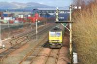 An oil train shortly after leaving the BP Grangemouth refinery on 28 February 2008 behind EWS 60063 is held at signals approaching Fouldubs Junction.<br><br>[John Furnevel 28/02/2008]