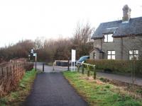 This station on the Lancaster to Glasson Dock branch closed in 1930 although goods trains passed through until 1964. The line is now a cycle path along the River Lune. The station house is still in use and the level crossing gate posts are in situ but the station site is a picnic area and car park. View towards Lancaster.(SD 457561)<br><br>[Mark Bartlett 07/03/2008]