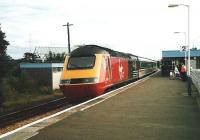 Aberdeen bound HST at Kirkcaldy in July 1998 with Virgin XC liveried power cars and carriages in IC colours.<br><br>[David Panton /07/1998]