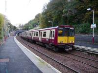314 214 with a service for Glasgow via Queens Park at Kirkhill on 13 October 2007.<br><br>[David Panton 13/10/2007]