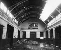 The booking hall of Fraserburgh passenger station in 1979, looking north towards the exit to the street. The ticket offices were on the right, and waiting rooms on the left. <br><br>[John Williamson 02/11/1979]