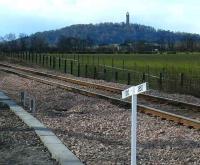 Linear Alignment. Looking west from Blackgrange crossing on 24 March, a new gradient marker below the Wallace Monument.<br><br>[Brian Forbes 24/03/2008]