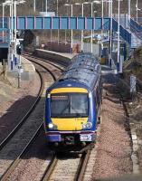 <I>Happy birthday to you!</I> First ScotRail 170 455 leaves Dalgety Bay on 27 March 2008, the occasion of the stations 10th anniversary.<br><br>[Bill Roberton 27/03/2008]