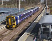 A northbound 158 pauses at Dalgety Bay on 27 March.<br><br>[Bill Roberton 27/03/2008]