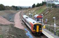 Panorama taken on 7 April 2008 showing the extensive excavation and clearance work that has been carried out in the area surrounding Livingston North station as a 158 prepares to leave with a service for Edinburgh. <br><br>[James Young 07/04/2008]