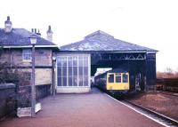 Malton station (1845) and original train shed photographed in 1987 with a DMU about to leave with a service to York.<br><br>[Ian Dinmore //1987]