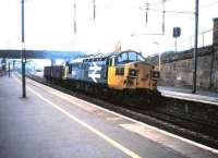 37 051 takes a lightweight freight south through Motherwell in October 1987.<br><br>[David Panton /10/1987]