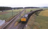 25234 coming off the former Hopeman branch with a freight from Burghead stands at Alves Junction awaiting clearance onto the Aberdeen - Inverness line on 3 August 1979.<br><br>[Peter Todd 03/08/1979]
